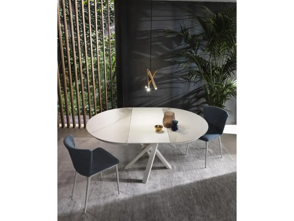 Tavolo allungabile Shangai Round con top in ceramica e base in alluminio verniciato di Riflessi